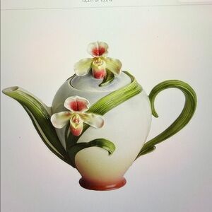The “Lady Slipper Orchid” teapot by Franz Excellent condition & never used.